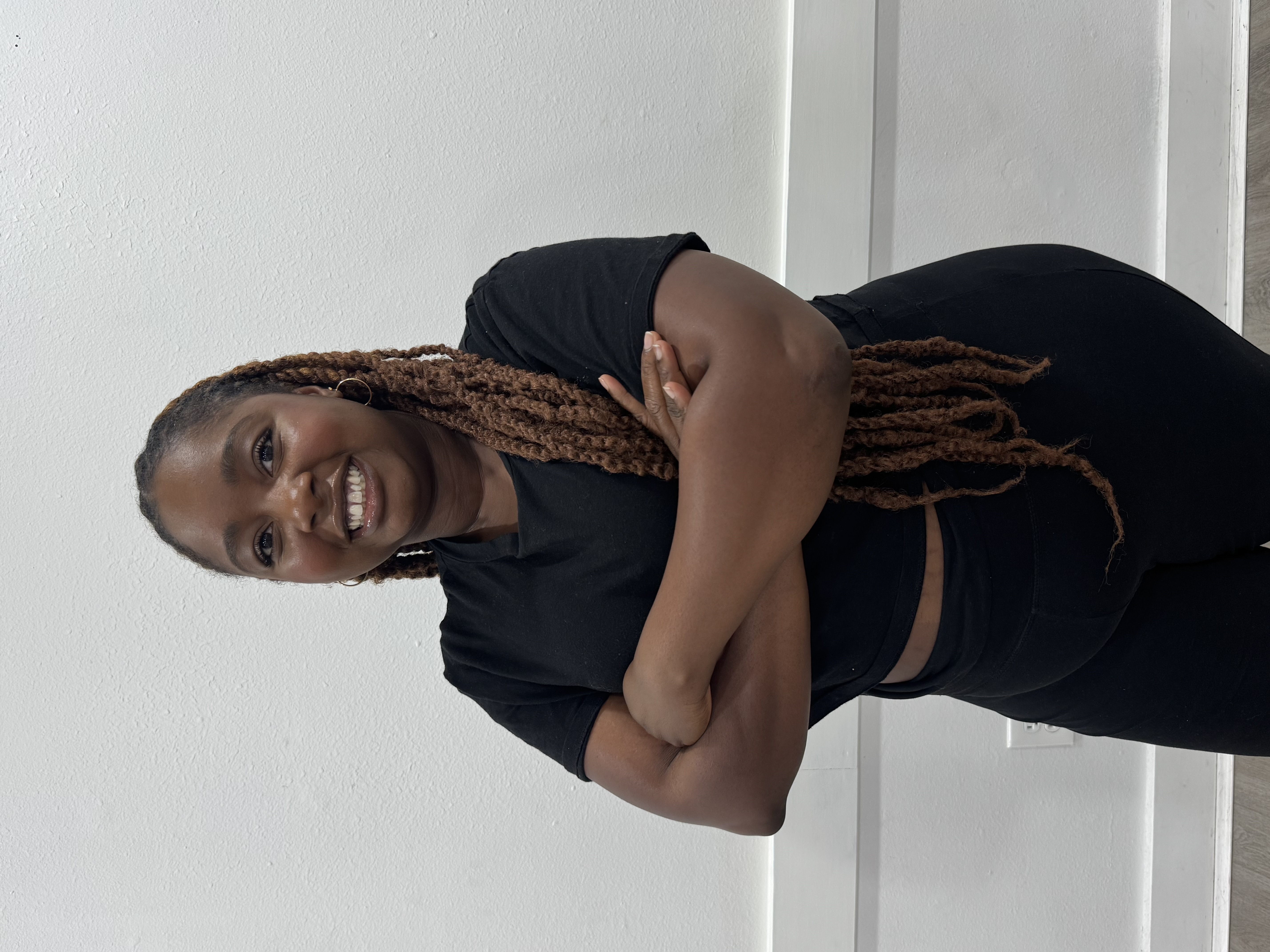 Portrait of Afrobeats instructor Angela Decembre.
