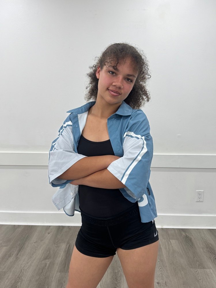 Portrait of Channing Pectol in the Latin Dance Utah studio.