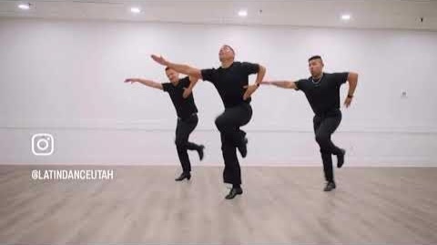 A dancer training a dynamic movement phrase in the studio.